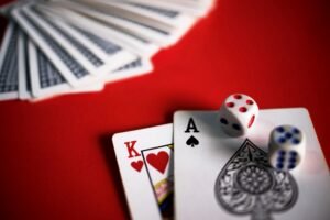 A game of blackjack with a king and an ace face-up.